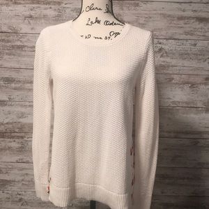 Beautiful cream sweater with back silk detail